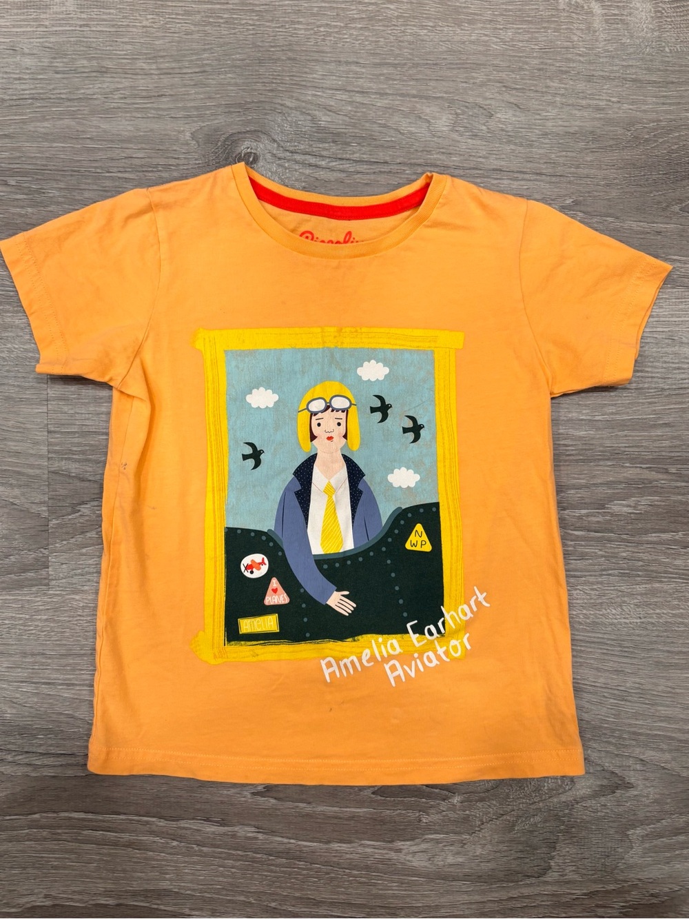 Piccolina Girls 5/6 Orange Amelia Earhart
Aviator Graphic Print Tee Cotton